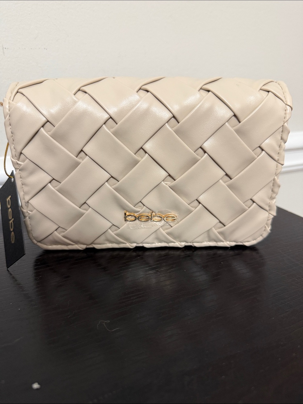 bebe Woven Clutch with Gold Logo in Cream